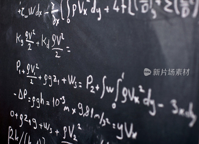 Mathematical equation on a chalkboard